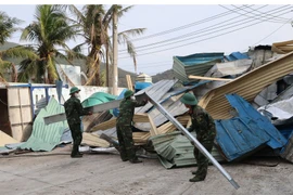 Prime Minister Pham Minh Chinh urges localities in the central region to assess storm and flood damage and expedite recovery efforts. (Photo: VNA)