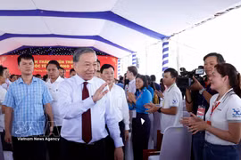 Party General Secretary and State President To Lam meets labourers in Ho Chi Minh City on April 27. (Photo: VNA)