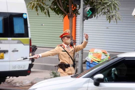 An on-duty traffic police officer in Hanoi. (Illustrative photo: VNA)