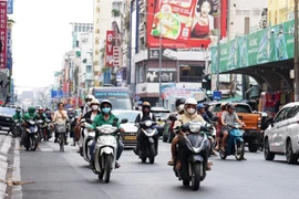 Vehicles in HCM City. The city considers installing hundreds of additional monitoring stations for air quality control. (Photo: VNA)