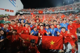 Vietnam’s U22 players revel in their victory. (Photo: VNA)