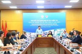 Deputy Minister of Agriculture and Environment Nguyen Hoang Hiep meets with members of the Disaster Risk Reduction Partnership (DRRP) to share updates on post-storm flooding and discuss emergency relief measures (Photo: VNA)