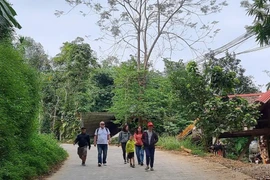 Tourists visit Pu Luong in Ba Thuoc distrit, Thanh Hoa province. (Photo: VNA)