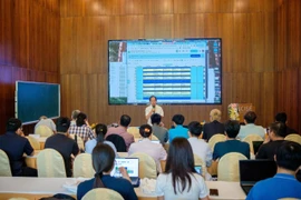 The two-week programme gathers nearly 40 scientists, young researchers, PhD students, engineers, technicians, and students from five countries. (Photo: VNA)