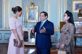 Prime Minister Pham Minh Chinh, his spouse Le Thi Bich Tran, and Crown Princess of Sweden Victoria. (Photo: VNA)
