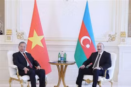 General Secretary of the Communist Party of Vietnam (CPV) Central Committee To Lam (left) and Azerbaijani President Ilham Aliyev. (Photo: VNA)