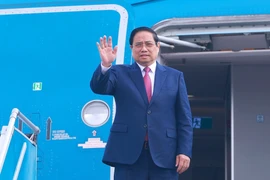 Prime Minister Pham Minh Chinh leaves Hanoi for Laos on December 2 morning to attend the Vietnam–Laos Politburos’ meeting and co-chair the 48th session of the Vietnam–Laos Intergovernmental Committee. (Photo: VNA)