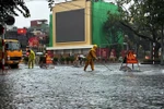 Heavy rain floods multiple streets in Hanoi