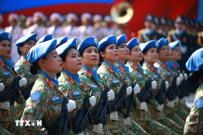 Vietnamese female peacekeepers march in the parade marking the 50th anniversary of the liberation of the South and national reunification on April 30 (Photo: VNA) peacekeeper.jpg