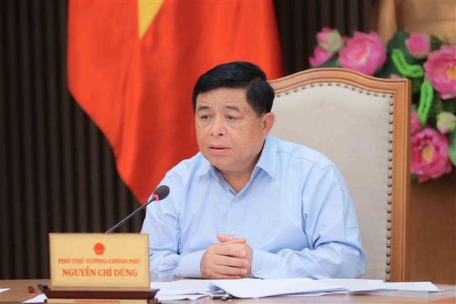 Deputy Prime Minister Nguyen Chi Dung speaks at the meeting (Photo: VNA) dung.jpg