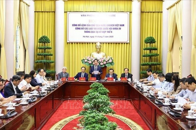 At the press conference. (Photo: VNA) vna-potal-cong-bo-lenh-cua-chu-tich-nuoc-ve-9-luat-vua-duoc-quoc-hoi-thong-qua-stand-1.jpg