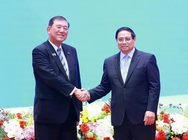 Prime Minister Pham Minh Chinh (right) and Japanese counterpart Ishiba Shigeru at the Vietnam-Japan Business Forum. (Photo: VNA) japanese-pm.jpg