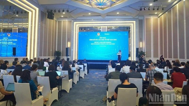 An overview of the report launching seminar (Photo: nhandan.vn) oecd-2.jpg