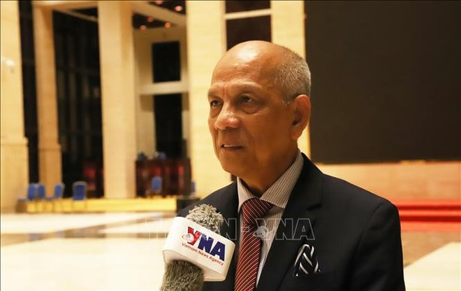 BAOV Chairman Nguyen Hong Hue talks to a VNA reporter in Laos. (Photo: VNA) se.jpg