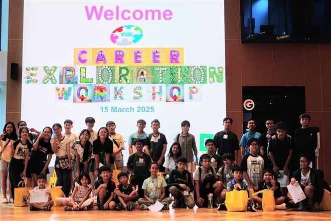 Children attend the event at Singapore-based Google office. (Photo: VNA) vna-potal-uom-mam-tai-nang-khoa-hoc-cong-nghe-trong-cong-dong-nguoi-viet-nam-tai-singapore-7916112.jpg