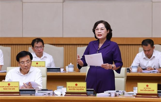 Governor of the State Bank of Vietnam Nguyen Thi Hong speaks at the meeting. (Photo: VNA)