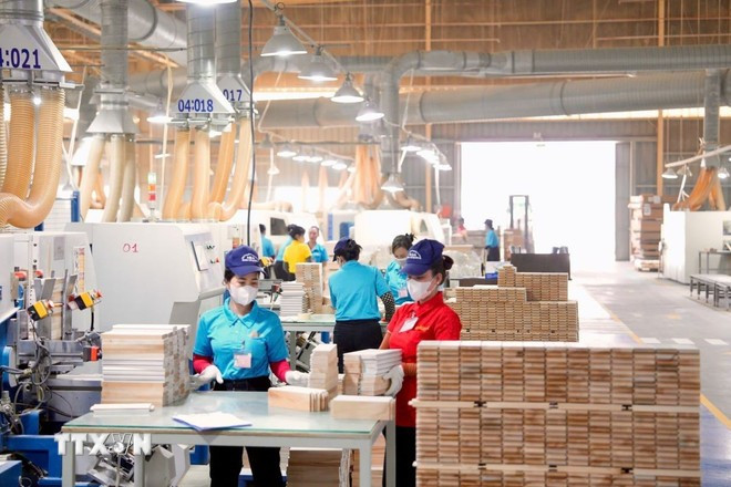 A wood processing plant of the Y-A Chau Industrial Door Co., Ltd. in Tan Uyen city, Binh Duong province (Photo: VNA) y-a-chau-vna.jpg