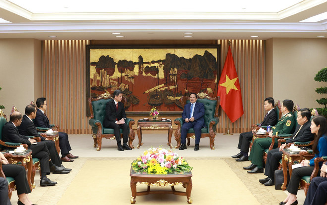 vna-pham-minh-chinh-singapore-party-official.jpg