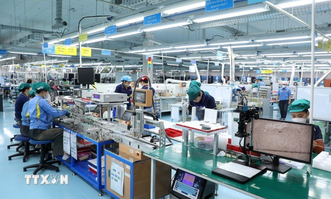 Vietnam aims to accomplish the 2030 goals of becoming a modern, industrialised middle-income country, and to become a fully developed high-income nation by 2045. (Illustrative image. Source: VNA) khoa-hoc.jpg