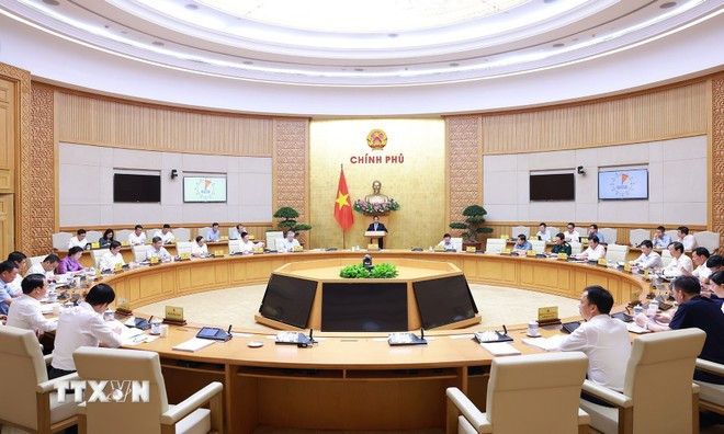 At the April regular meeting (Photo: VNA) pham-minh-chinh-2.jpg