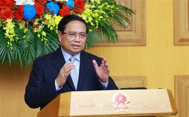 Prime Minister Pham Minh Chinh addresses the roundtable (Photo: VNA)