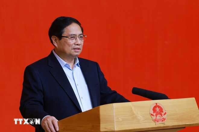 Prime Minister Pham Minh Chinh (Photo: VNA) thu-tuong-chu-tri-phien-hop-lan-thu-tu-cua-tieu-ban-kinh-te-xa-hoi-1303-5.jpg