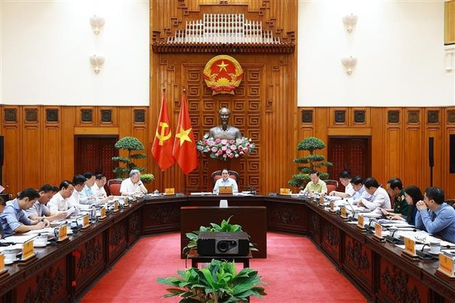 An overview of the meeting (Photo: VNA) vna-potal-thu-tuong-chu-tri-hop-thuong-truc-chinh-phu-ve-cac-van-de-thuong-mai-voi-hoa-ky-7987022.jpg
