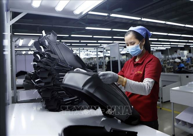 Production activities at Cellmech International Vina Company in Khai Quang Industrial Park, Vinh Yen city, Vinh Phuc province. (Photo: VNA) fdi-05032025-01.jpg