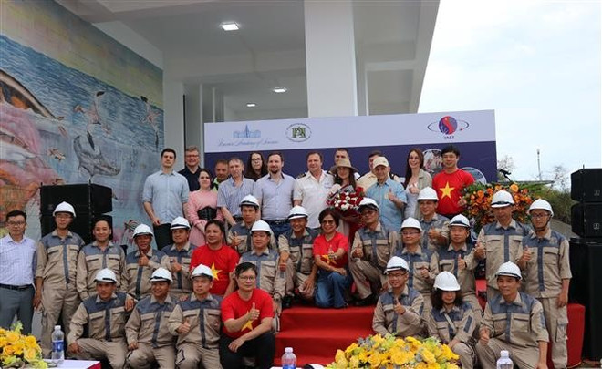 30 Vietnamese and Russian scientists gather at the welcome ceremony. (Photo: VNA) he-6475.jpg