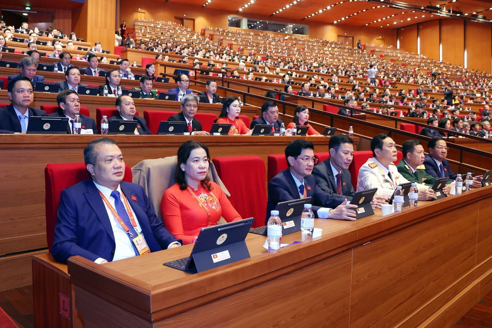 The delegation attends the discussion on the Congress documents on the morning of January 21. (Photo: VNA)