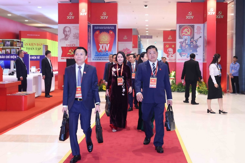 Delegates arrive to attend the National Party Congress. (Photo: VNA)