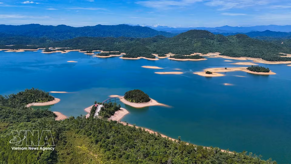 Small islands dot Ke Go Lake, enhancing its spectacular natural scenery. (Photo: Huu Quyet - VNA)
