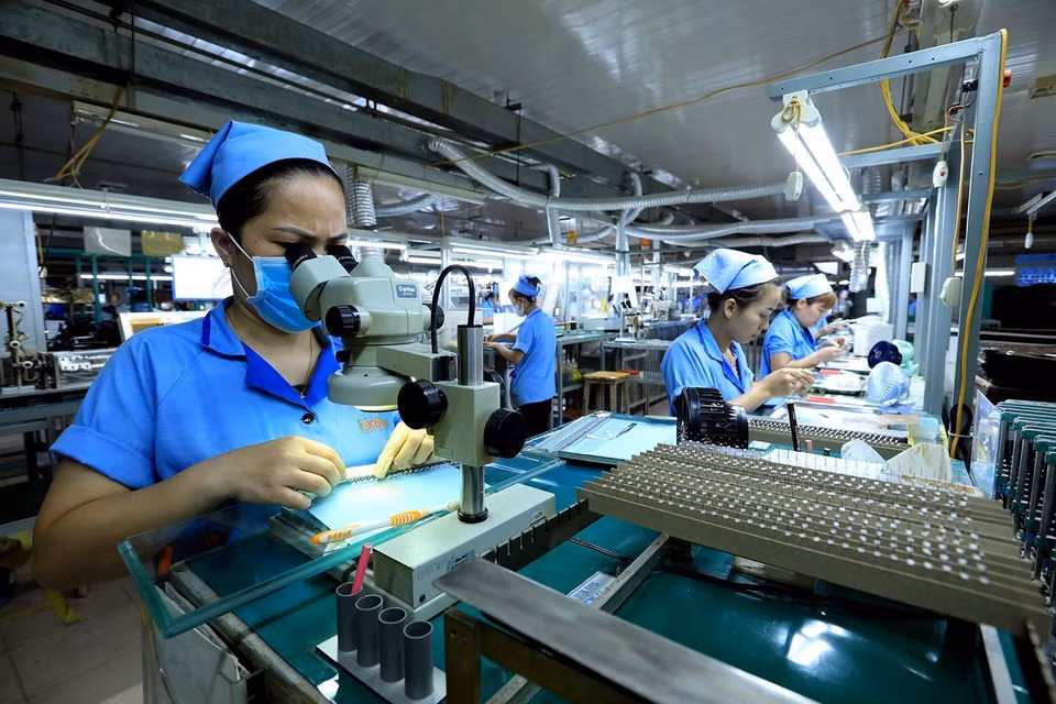 Disbursement of foreign direct investment reached 10.8 billion USD in the first half, marking an 8.2% increase compared to the same period last year. (Photo: VNA)