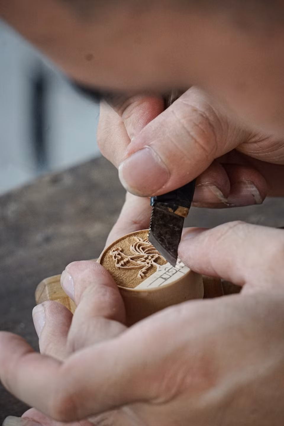 The most difficult step in the craft is the carving process, requiring intense focus, care, and precision from the artisan. (Photo: VNA)