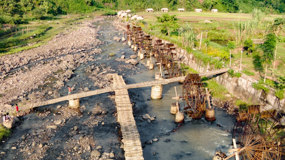 Water wheels created by Na Su residents serve as attractions for visitors. (Photo: VNA)