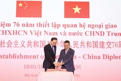 Vietnamese Ambassador Pham Thanh Binh (right) and Chinese Vice Minister of Foreign Affairs Sun Weidong at the ceremony marking the 76th anniversary of the establishment of Vietnam-China diplomatic relations in Beijing on February 2. (Photo: VNA)