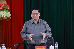 Prime Minister Pham Minh Chinh addresses the working session with Thanh Hoa officials on November 9. (Photo: VNA)