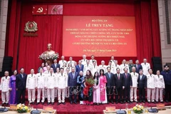 Party General Secretary To Lam and other delegates at the event. (Photo: VNA)