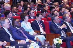 Delegates attend the opening ceremony and high-level conference of the United Nations Convention against Cybercrime. (Photo: VNA)