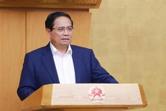 Prime Minister Pham Minh Chinh addresses the meeting on May 22. (Photo: VNA)
