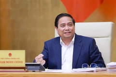 Prime Minister Pham Minh Chinh addresses the Government’s law-building session in Hanoi on May 22. (Photo: VNA)