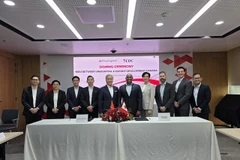 The MoU signing ceremony between Export Development Canada (EDC) and VinaCapital in HCM City on August 14. (Photo courtesy of the Consulate General of Canada in HCM City)