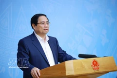 Prime Minister Pham Minh Chinh speaks at the conference (Photo: VNA)