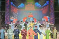 A performance at an Ao Dai festival in Hanoi. (Photo: VNA)
