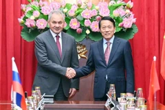 Minister of Public Security General Luong Tam Quang (right) and Secretary of the Russian Federation Security Council Sergei Shoigu at their meeting in Hanoi on December 9 (Photo: VNA)