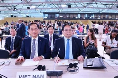 PM Pham Minh Chinh (right) and Deputy PM and Minister of Foreign Affairs Bui Thanh Son at the opening session of the third UN Ocean Conference in Nice, France, on June 9. (Photo: VNA)