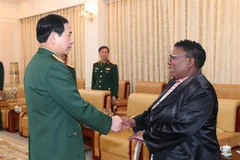 Minister of National Defence General Phan Văn Giang and Acting Secretary for Defence of South Africa Thobekile Gamede. (Photo: VNA)