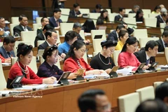 Female deputies of the National Assembly attend the opening session of the ninth sitting of the 15th National Assembly on May 5, 2025. (Photo: VNA)
