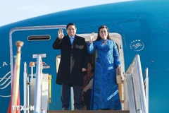 Prime Minister Pham Minh Chinh and his spouse arrive at O.R. Tambo Airport in Johannesburg on November 21 morning, starting their participation in the G20 Summit and a series of bilateral activities in South Africa. (Photo: VNA)