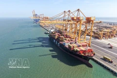 The first commercial vessel officially docks at berths 3 and 4 of Hai Phong Port Joint Stock Company. (Photo: VNA)